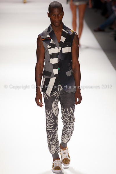 A model on the runway at the Custo Barcelona SS2013 show at New York Mercedes-Benz Fashion Week.