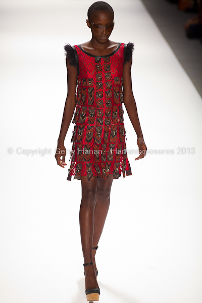 A model on the runway at the Custo Barcelona SS2013 show at New York Mercedes-Benz Fashion Week.