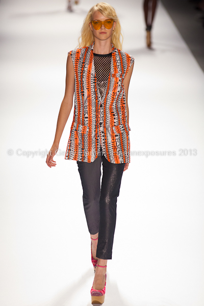 A model on the runway at the Custo Barcelona SS2013 show at New York Mercedes-Benz Fashion Week.