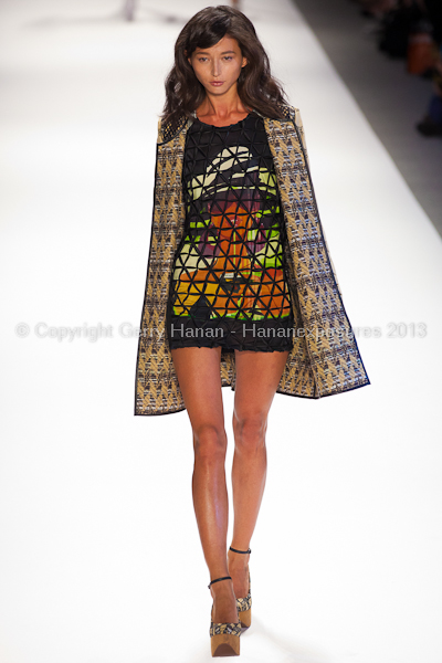 A model on the runway at the Custo Barcelona SS2013 show at New York Mercedes-Benz Fashion Week.