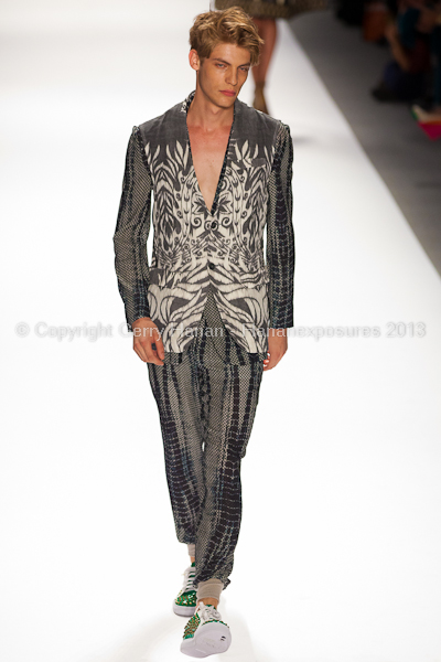 A model on the runway at the Custo Barcelona SS2013 show at New York Mercedes-Benz Fashion Week.