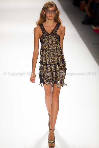 A model on the runway at the Custo Barcelona SS2013 show at New York Mercedes-Benz Fashion Week.