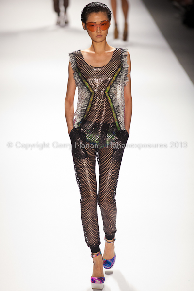 A model on the runway at the Custo Barcelona SS2013 show at New York Mercedes-Benz Fashion Week.