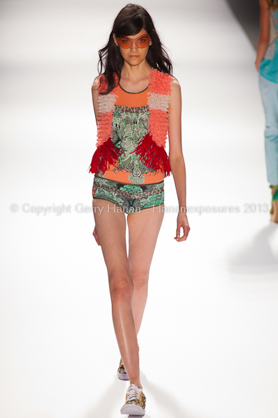 A model on the runway at the Custo Barcelona SS2013 show at New York Mercedes-Benz Fashion Week.