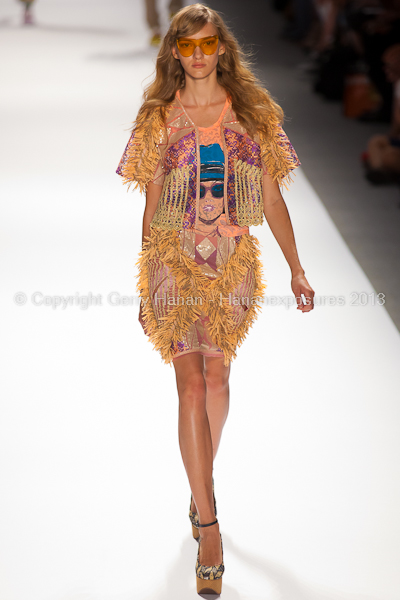 A model on the runway at the Custo Barcelona SS2013 show at New York Mercedes-Benz Fashion Week.