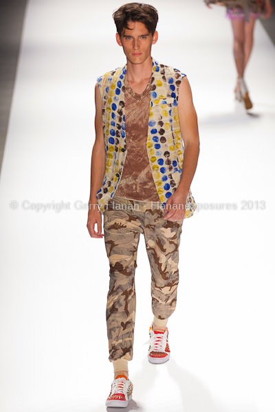 A model on the runway at the Custo Barcelona SS2013 show at New York Mercedes-Benz Fashion Week.