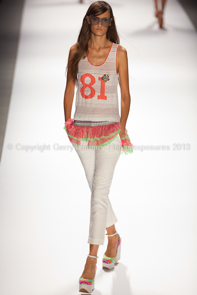 A model on the runway at the Custo Barcelona SS2013 show at New York Mercedes-Benz Fashion Week.