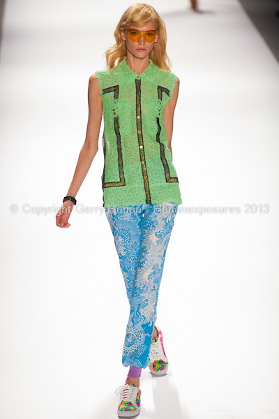 A model on the runway at the Custo Barcelona SS2013 show at New York Mercedes-Benz Fashion Week.