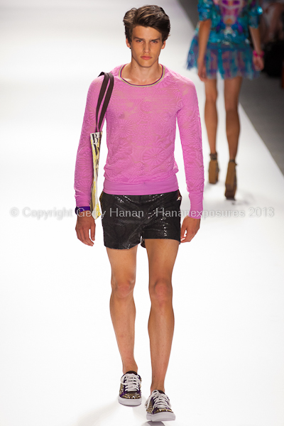 A model on the runway at the Custo Barcelona SS2013 show at New York Mercedes-Benz Fashion Week.