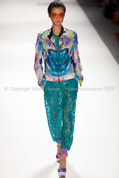 A model on the runway at the Custo Barcelona SS2013 show at New York Mercedes-Benz Fashion Week.