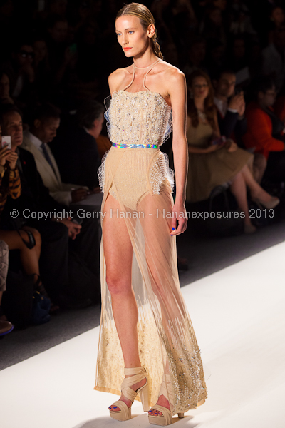 A model on the runway at the Falguni Shane Peacock SS2013 show at New York Mercedes-Benz Fashion Week.