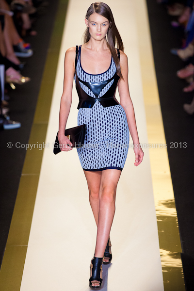 A model on the runway at the Herve Leger SS2013 show at New York Mercedes-Benz Fashion Week.