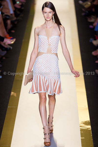 A model on the runway at the Herve Leger SS2013 show at New York Mercedes-Benz Fashion Week.