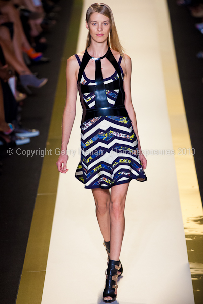 A model on the runway at the Herve Leger SS2013 show at New York Mercedes-Benz Fashion Week.