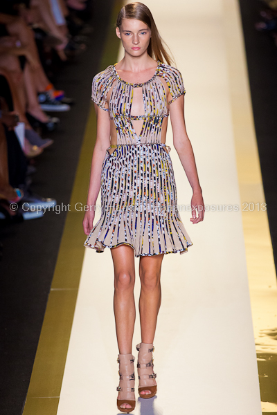 A model on the runway at the Herve Leger SS2013 show at New York Mercedes-Benz Fashion Week.