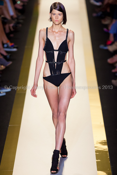 A model on the runway at the Herve Leger SS2013 show at New York Mercedes-Benz Fashion Week.