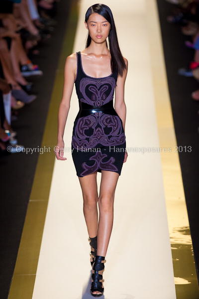 A model on the runway at the Herve Leger SS2013 show at New York Mercedes-Benz Fashion Week.