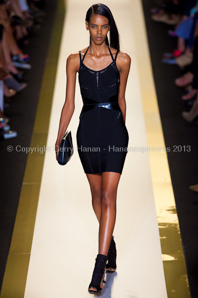 A model on the runway at the Herve Leger SS2013 show at New York Mercedes-Benz Fashion Week.