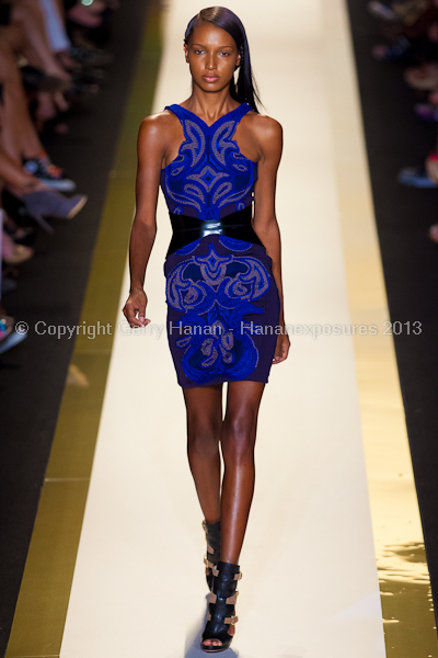 A model on the runway at the Herve Leger SS2013 show at New York Mercedes-Benz Fashion Week.