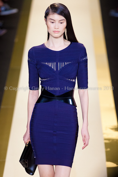 A model on the runway at the Herve Leger SS2013 show at New York Mercedes-Benz Fashion Week.