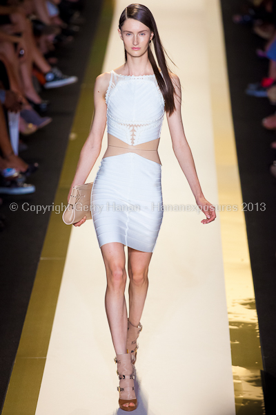 A model on the runway at the Herve Leger SS2013 show at New York Mercedes-Benz Fashion Week.