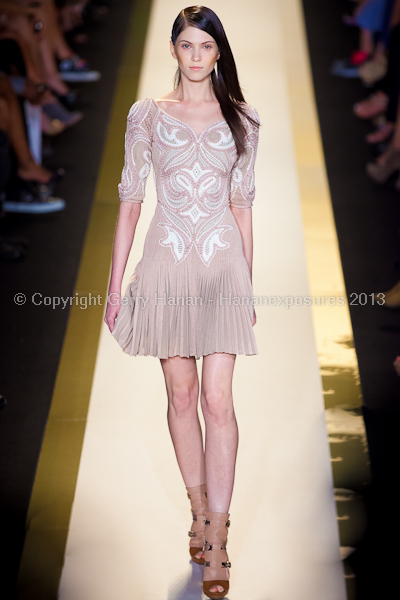 A model on the runway at the Herve Leger SS2013 show at New York Mercedes-Benz Fashion Week.