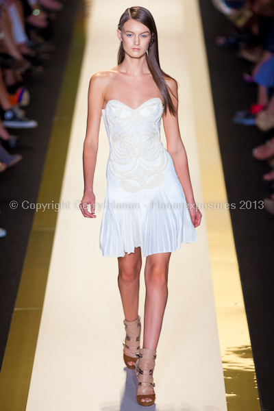 A model on the runway at the Herve Leger SS2013 show at New York Mercedes-Benz Fashion Week.