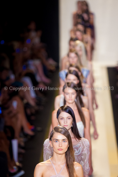 A model on the runway at the Herve Leger SS2013 show at New York Mercedes-Benz Fashion Week.