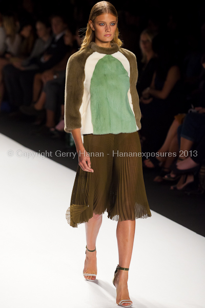 A model on the runway at the J Mendel SS2013 show at New York Mercedes-Benz Fashion Week.