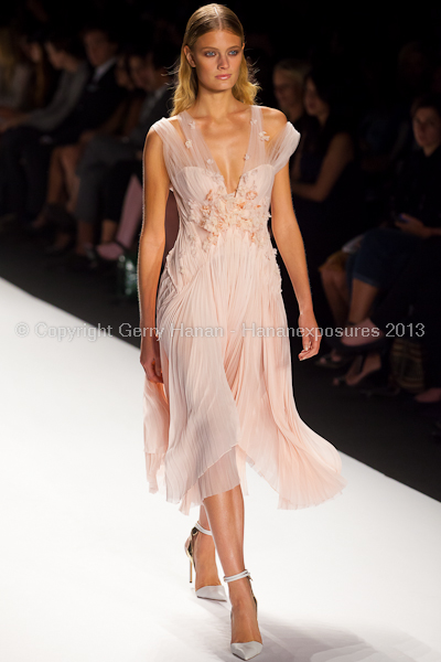 A model on the runway at the J Mendel SS2013 show at New York Mercedes-Benz Fashion Week.