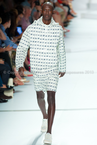 A model on the runway at the Lacoste SS2013 show at New York Mercedes-Benz Fashion Week.