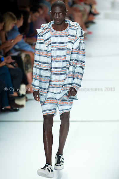 A model on the runway at the Lacoste SS2013 show at New York Mercedes-Benz Fashion Week.