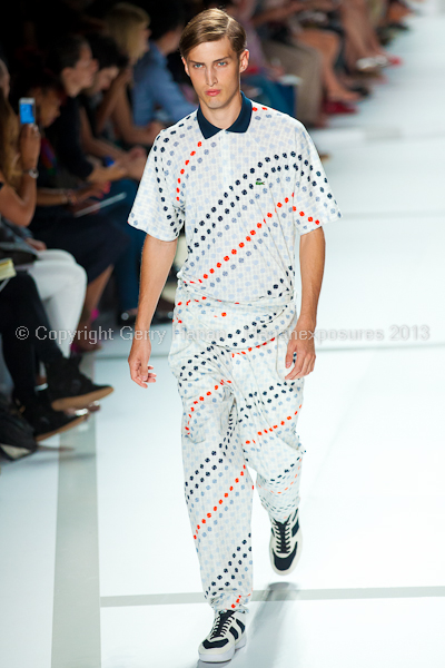 A model on the runway at the Lacoste SS2013 show at New York Mercedes-Benz Fashion Week.