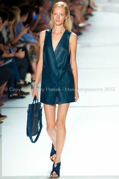 A model on the runway at the Lacoste SS2013 show at New York Mercedes-Benz Fashion Week.