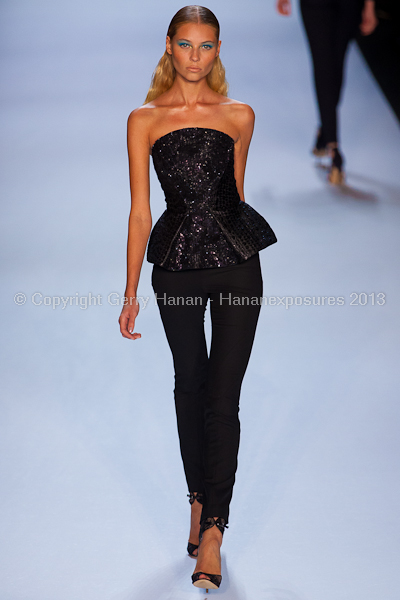 A model on the runway at the Monique Lhuillier SS2013 show at New York Mercedes-Benz Fashion Week.