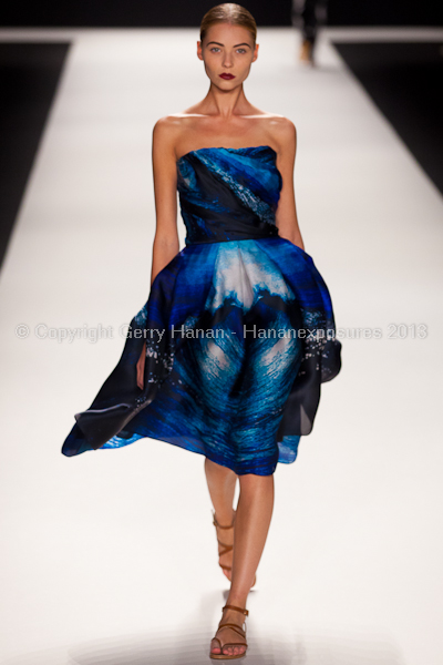 A model on the runway at the Naeem Khan SS2013 show at New York Mercedes-Benz Fashion Week.