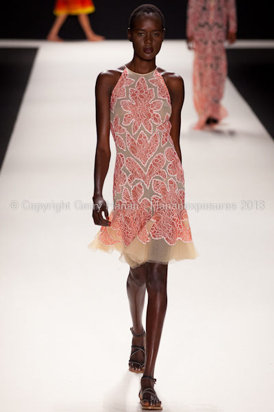 A model on the runway at the Naeem Khan SS2013 show at New York Mercedes-Benz Fashion Week.