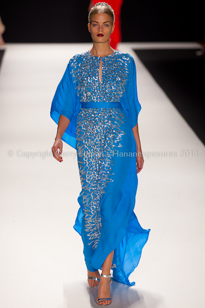 A model on the runway at the Naeem Khan SS2013 show at New York Mercedes-Benz Fashion Week.