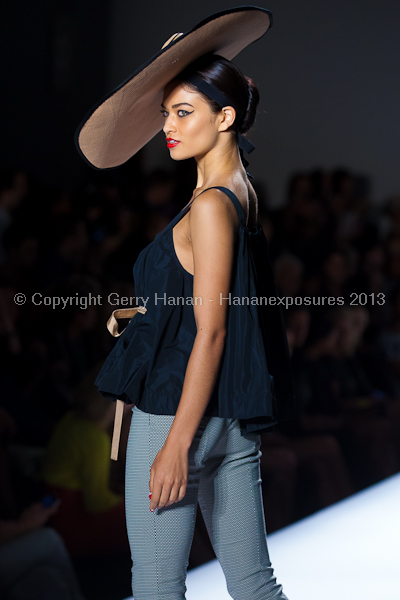 A model on the runway at the Norisol Ferrari SS2013 show at New York Mercedes-Benz Fashion Week.