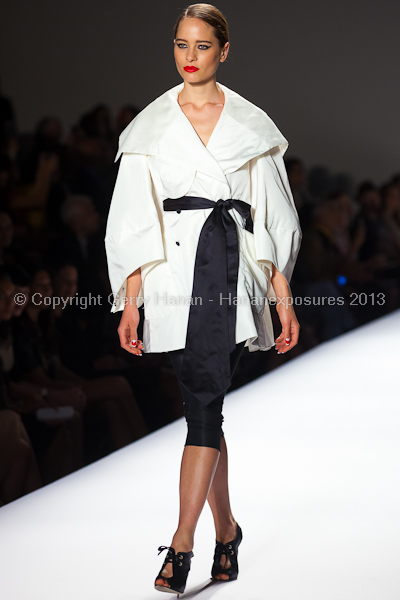 A model on the runway at the Norisol Ferrari SS2013 show at New York Mercedes-Benz Fashion Week.