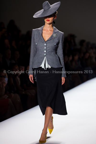 A model on the runway at the Norisol Ferrari SS2013 show at New York Mercedes-Benz Fashion Week.