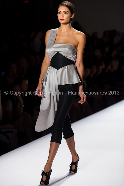 A model on the runway at the Norisol Ferrari SS2013 show at New York Mercedes-Benz Fashion Week.