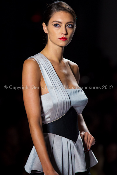 A model on the runway at the Norisol Ferrari SS2013 show at New York Mercedes-Benz Fashion Week.