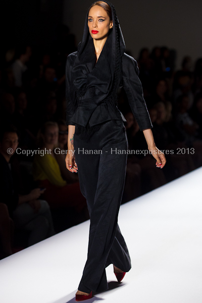 A model on the runway at the Norisol Ferrari SS2013 show at New York Mercedes-Benz Fashion Week.