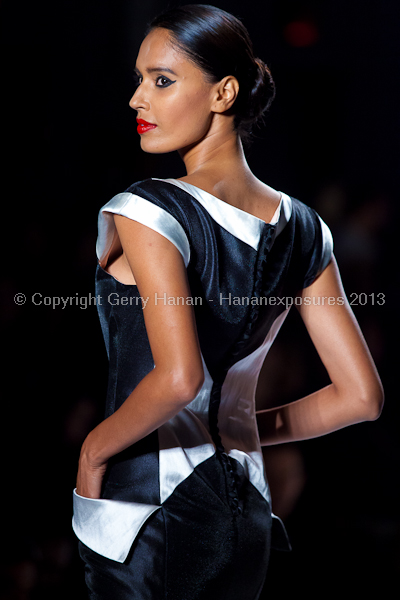 A model on the runway at the Norisol Ferrari SS2013 show at New York Mercedes-Benz Fashion Week.