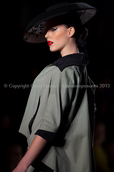 A model on the runway at the Norisol Ferrari SS2013 show at New York Mercedes-Benz Fashion Week.