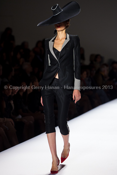 A model on the runway at the Norisol Ferrari SS2013 show at New York Mercedes-Benz Fashion Week.