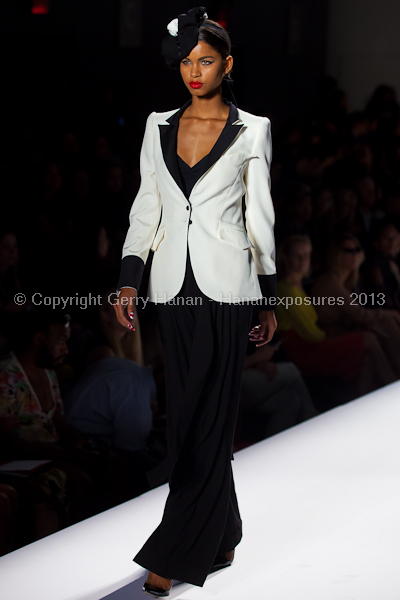 A model on the runway at the Norisol Ferrari SS2013 show at New York Mercedes-Benz Fashion Week.