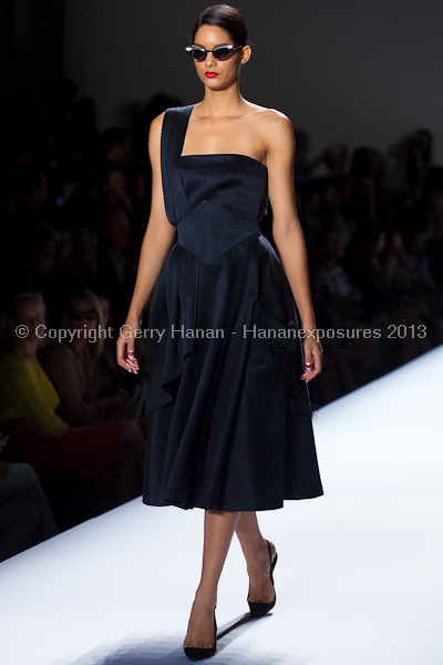 A model on the runway at the Norisol Ferrari SS2013 show at New York Mercedes-Benz Fashion Week.