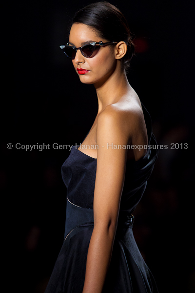 A model on the runway at the Norisol Ferrari SS2013 show at New York Mercedes-Benz Fashion Week.